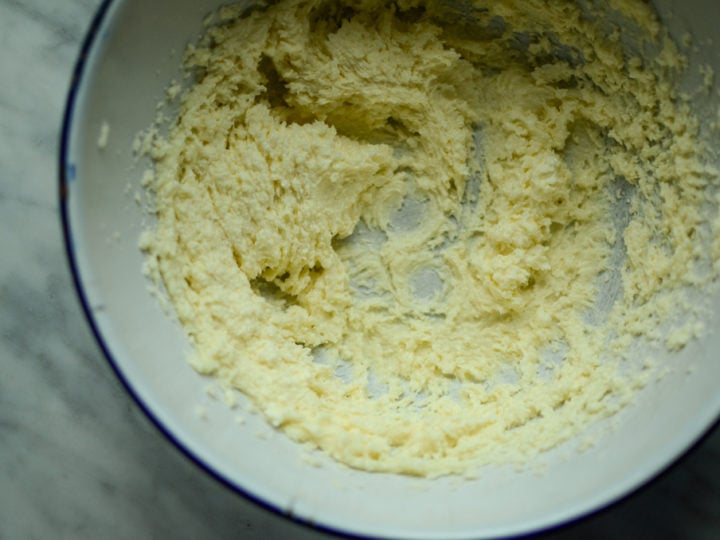 Whipped sugar and butter in a mixing bowl