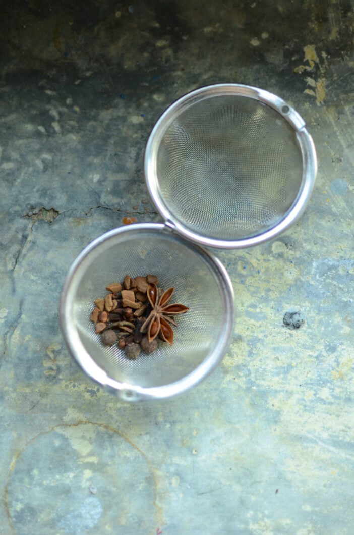 Mulling spices in a large, mesh tea ball. 