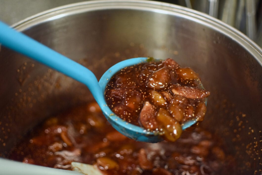 Ladling out the finished salted vanilla fig jam.