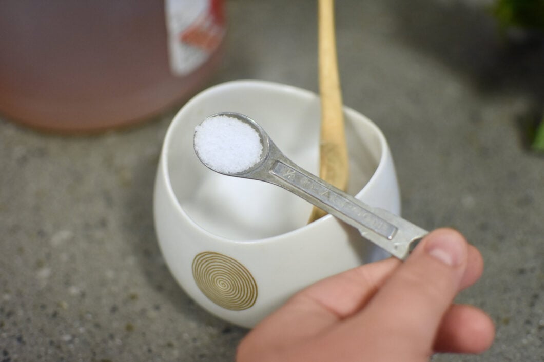 Measuring out 1/2 teaspoon kosher salt for the fig jam.
